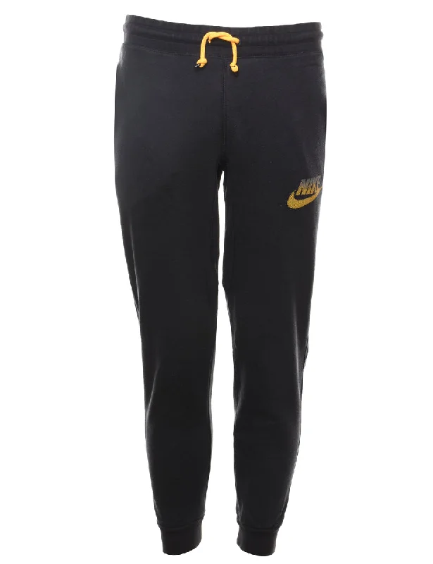 Savings Galore Nike Black & Yellow Jogging Bottoms - W28 L26